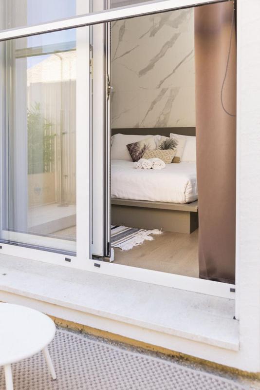 Le Palmette Suites Кальяри Экстерьер фото