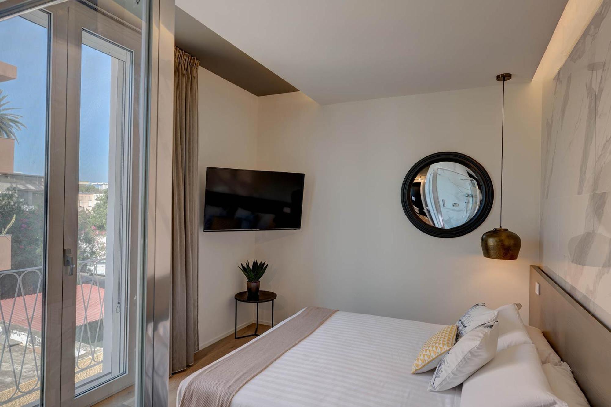 Le Palmette Suites Кальяри Экстерьер фото
