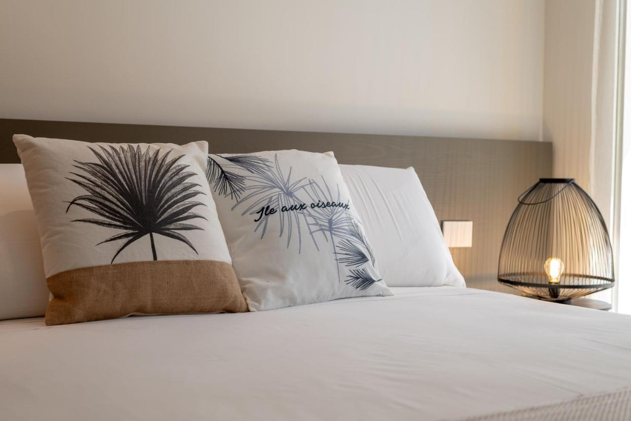 Le Palmette Suites Кальяри Экстерьер фото