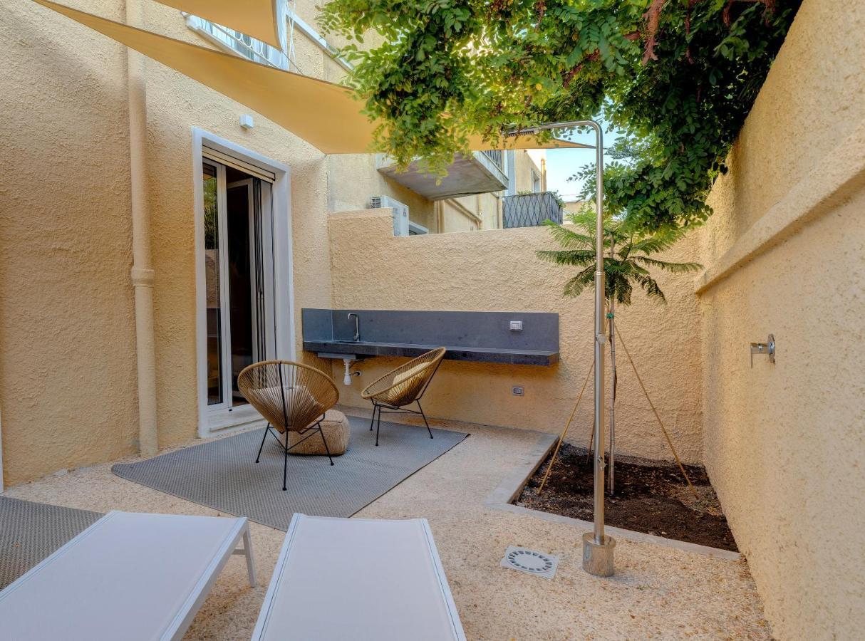 Le Palmette Suites Кальяри Экстерьер фото