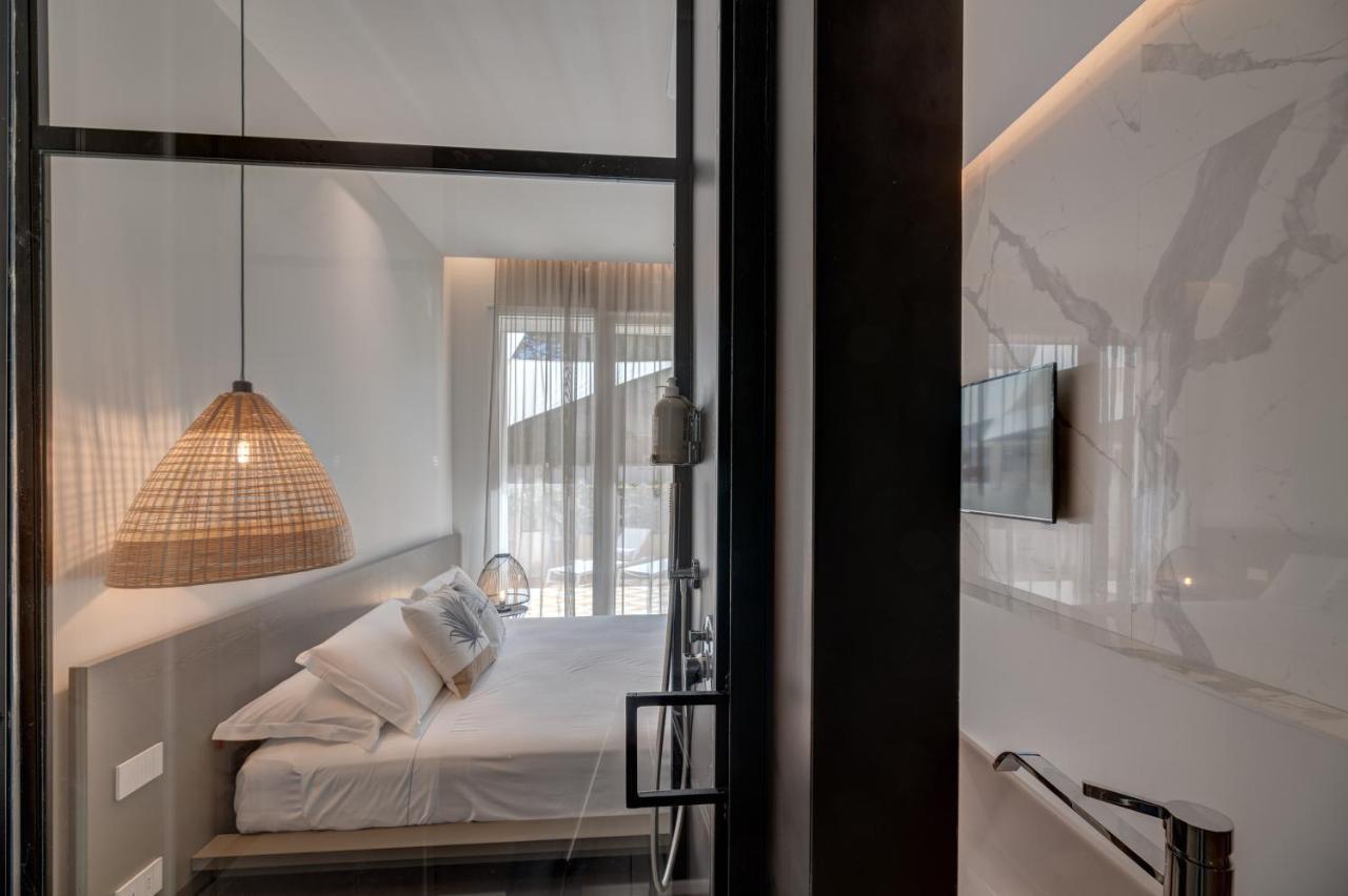 Le Palmette Suites Кальяри Экстерьер фото