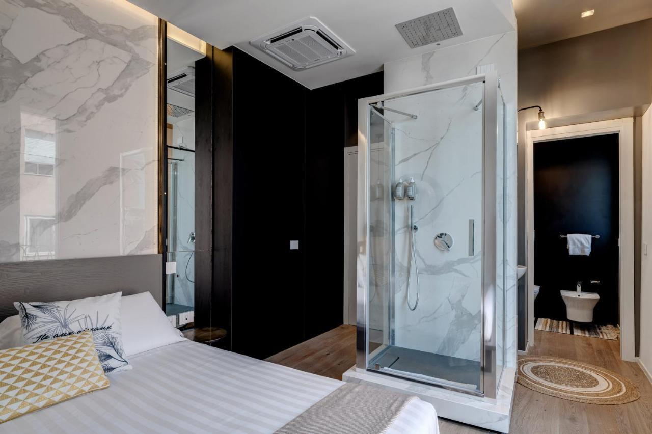 Le Palmette Suites Кальяри Экстерьер фото