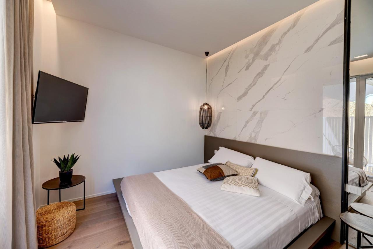 Le Palmette Suites Кальяри Экстерьер фото